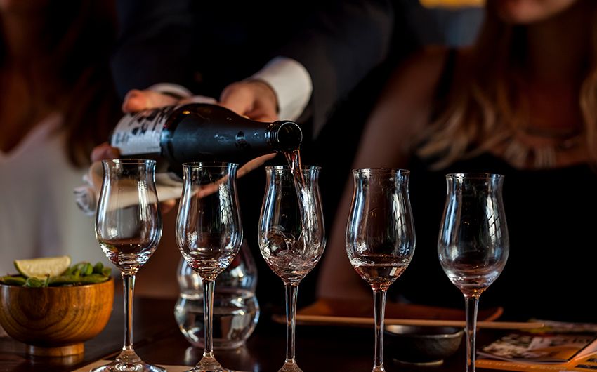 sake flights being poured at SUSHISAMBA