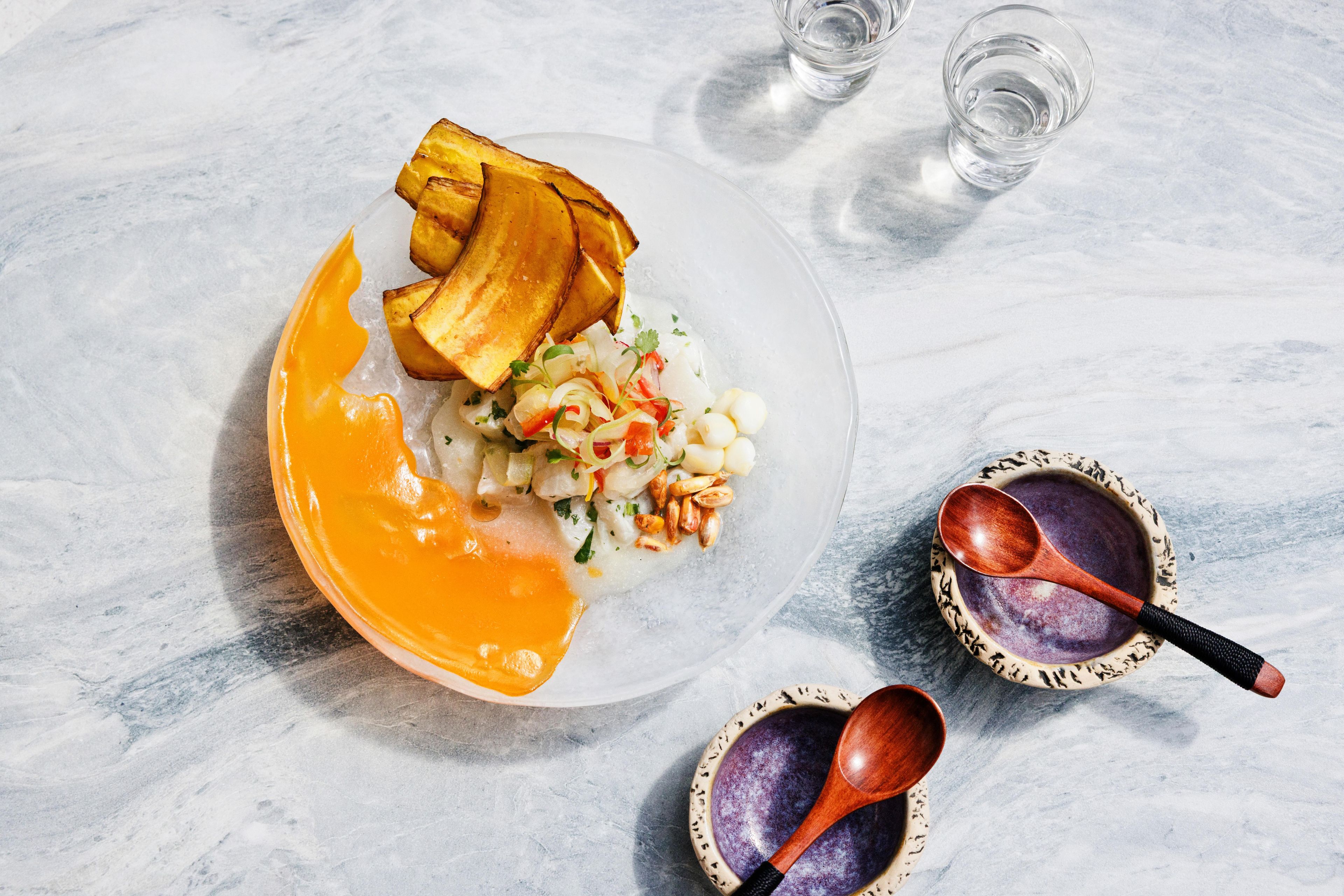 SUSHISAMBA Classico Seviche dish with white fish, sweet potato, cancha, plantain chips, coconut leche de tigre