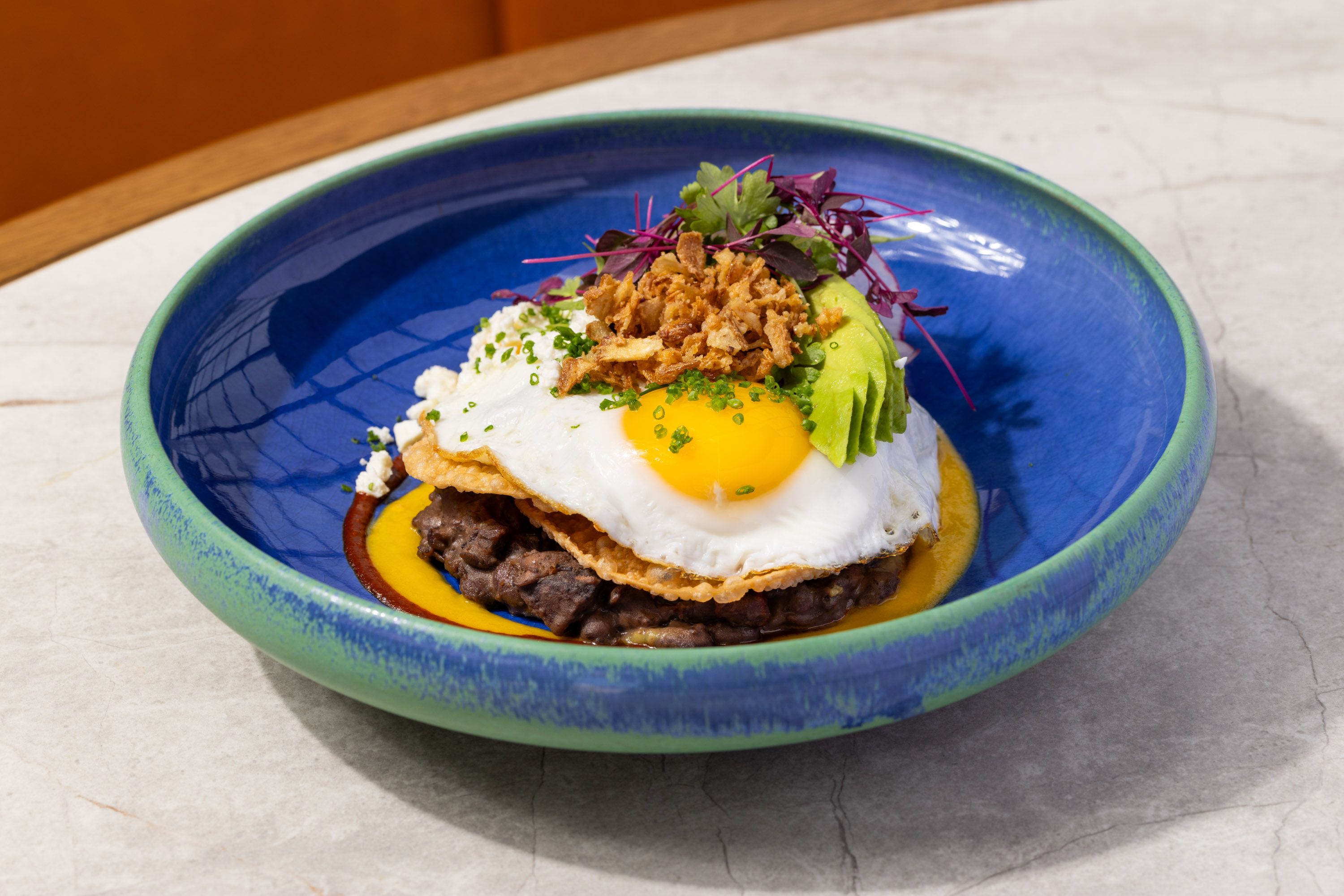 Enjoy Rooftop Brunch at SUSHISAMBA Los Angeles in West Hollywood, featuring a wide selection of dishes including a delicious Huevos Andinos.