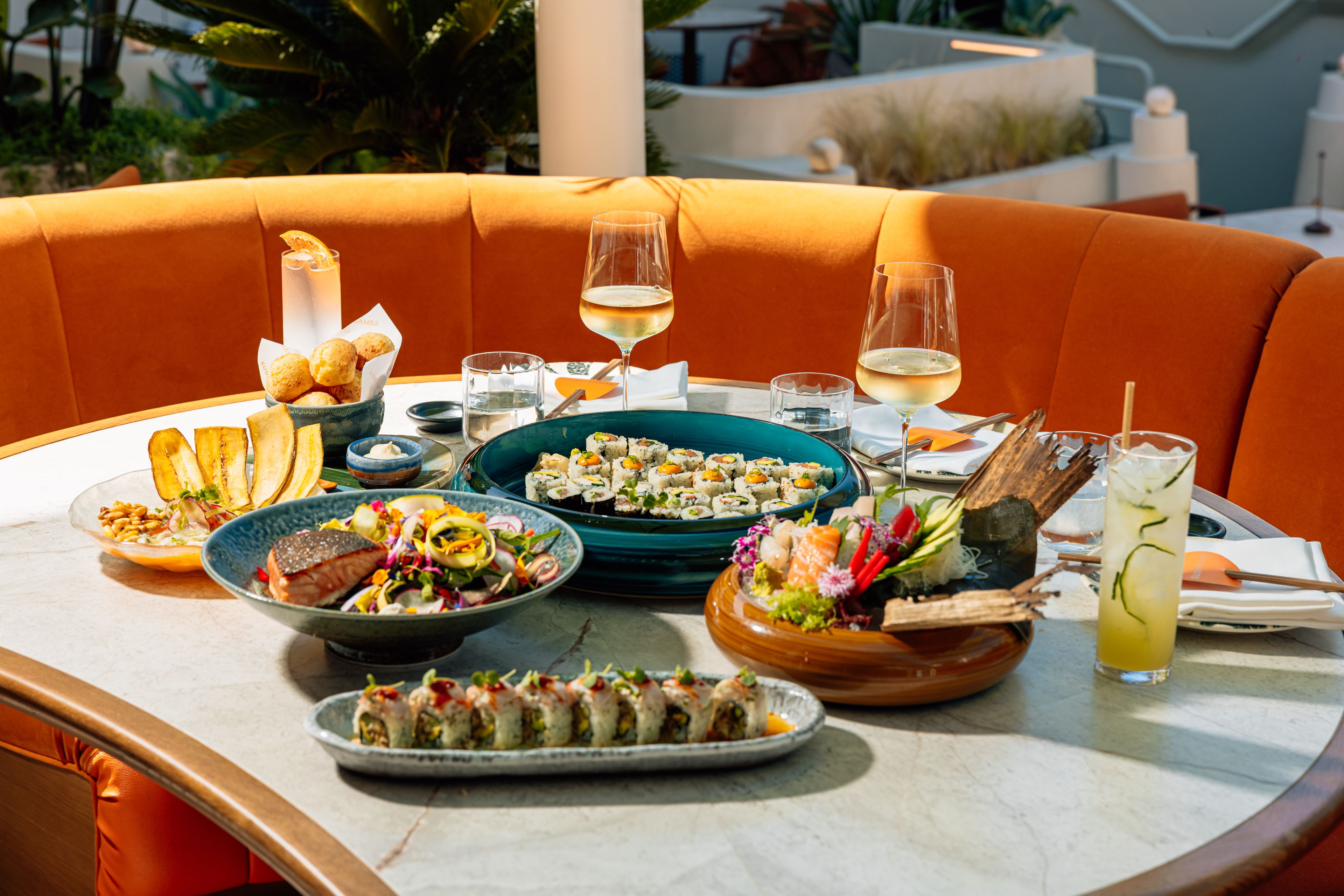 SUSHISAMBA Los Angeles lunch menu featuring Japanese, Brazilian and Peruvian dishes displayed on the table
