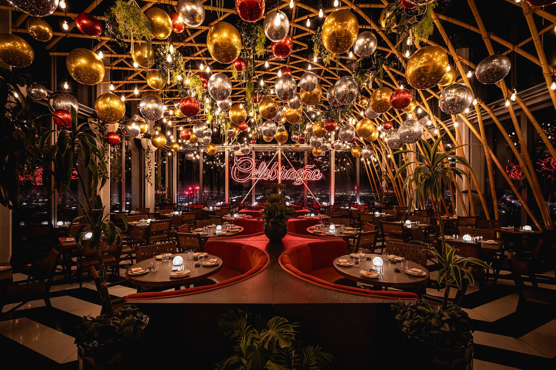 CHRISTMAS DECORATIONS AT SUSHISAMBA HERON TOWER. IMAGE SHOWS FOIL BALLOONS HANGING FROM THE CEILING